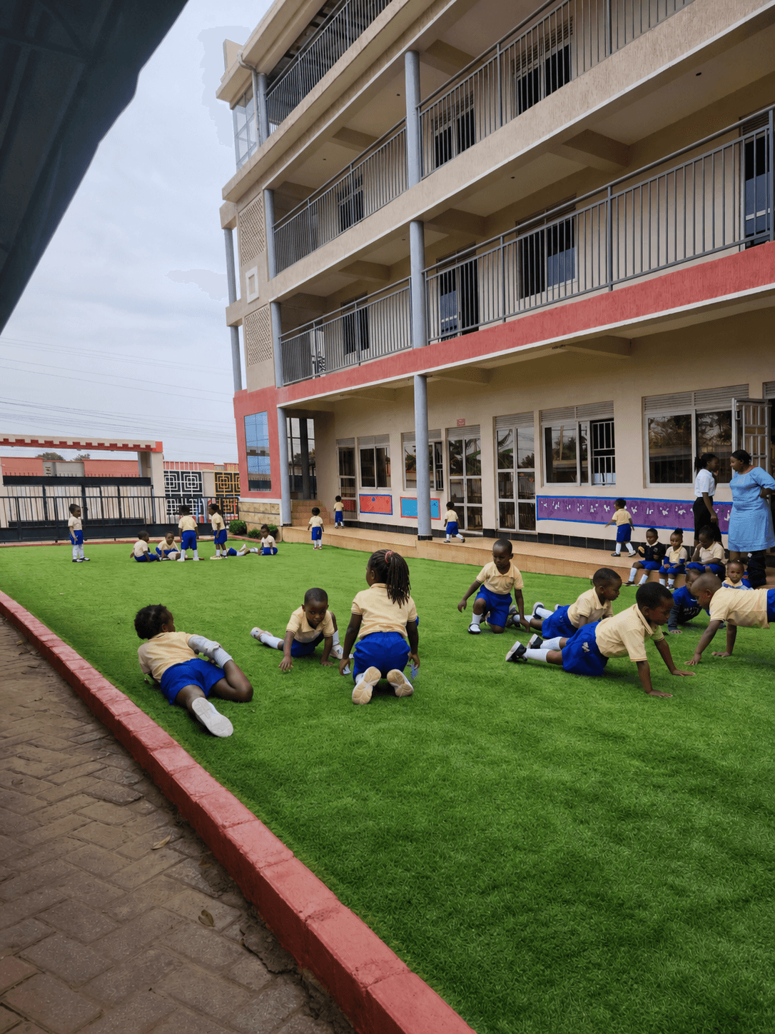 Anonymized children exploring and playing outdoors at school